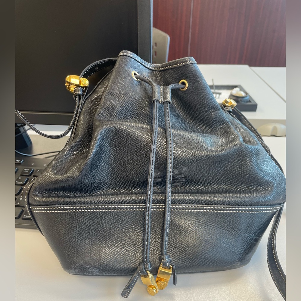 Authentic Loewe Black Leather bucket Bag, interior lining is flaking off.